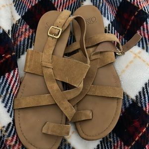 Used sandals tan color  size 10